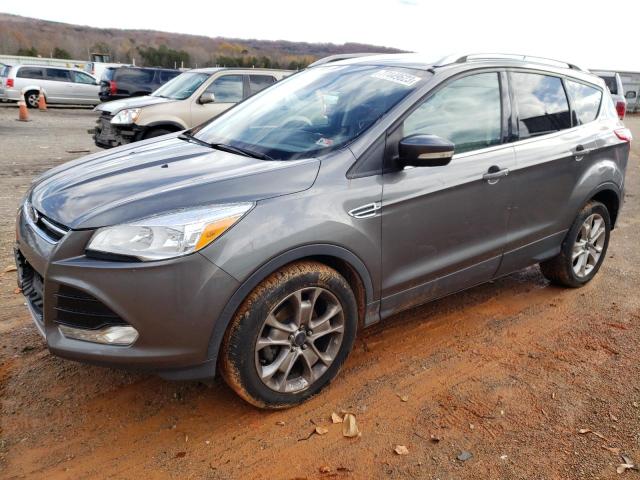 Obraz 1 z 2014 FORD ESCAPE TITANIUM 2014 z VIN 1FMCU0JXXEUD70087