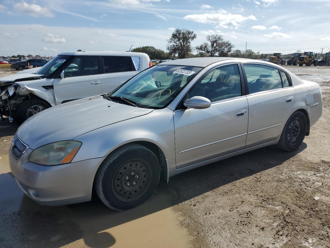 Obraz 1 z 2003 NISSAN ALTIMA BASE 2003 z VIN 1N4AL11D23C136447