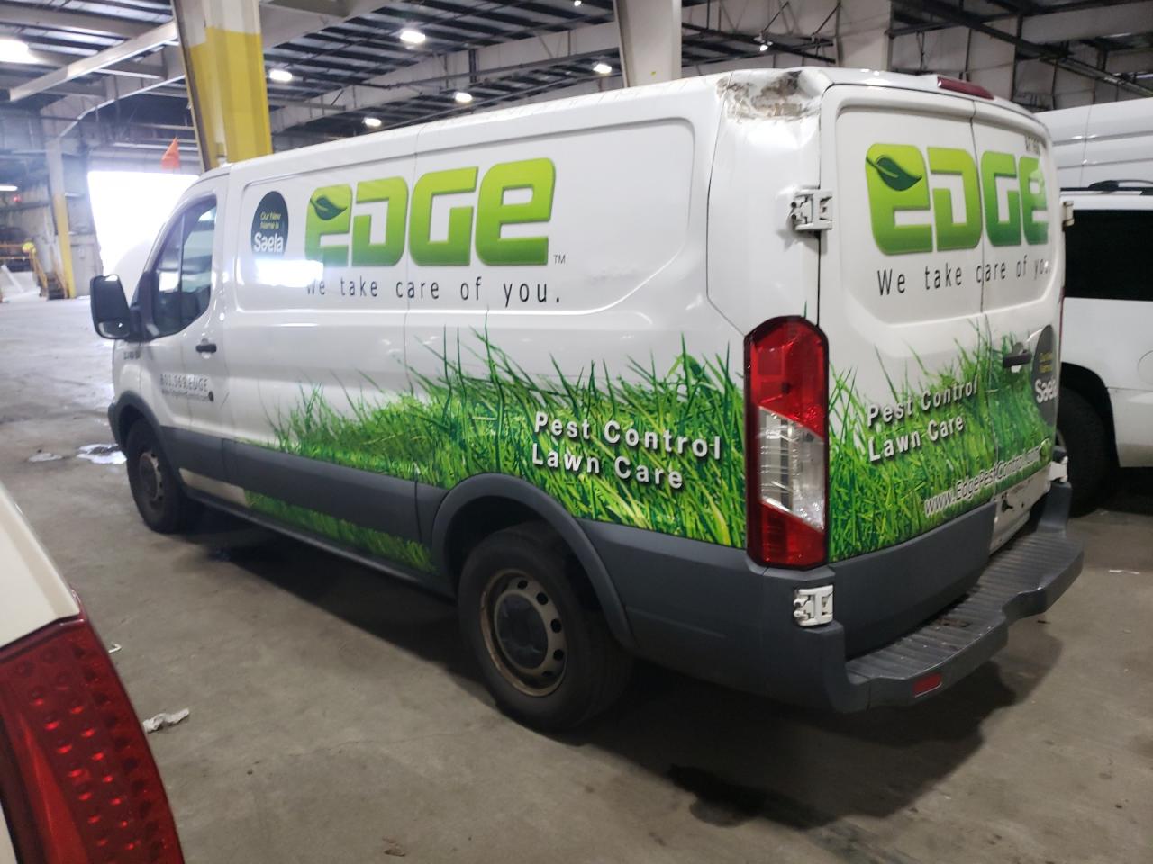 Image 2 of 2015 FORD TRANSIT T-150 2015 with VIN 1FTNE1YM4FKA28451