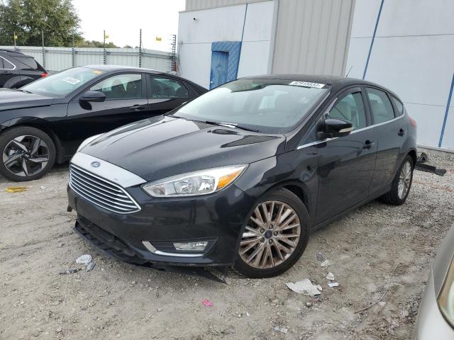 Image 1 of 2017 FORD FOCUS TITANIUM 2017 with VIN 1FADP3N29HL208595