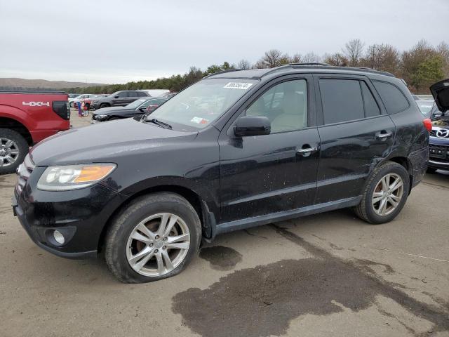 Image 1 of 2012 HYUNDAI SANTA FE LIMITED 2012 with VIN 5XYZKDAG9CG163975