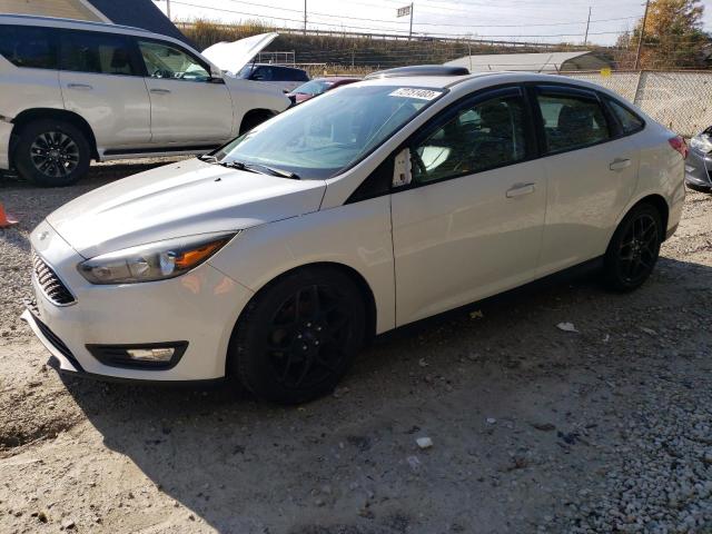 Obraz 1 z 2016 FORD FOCUS SE 2016 z VIN 1FADP3F28GL233405