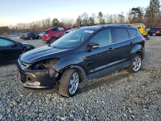 Obraz 1 z 2014 FORD ESCAPE TITANIUM 2014 z VIN 1FMCU9J98EUE31572