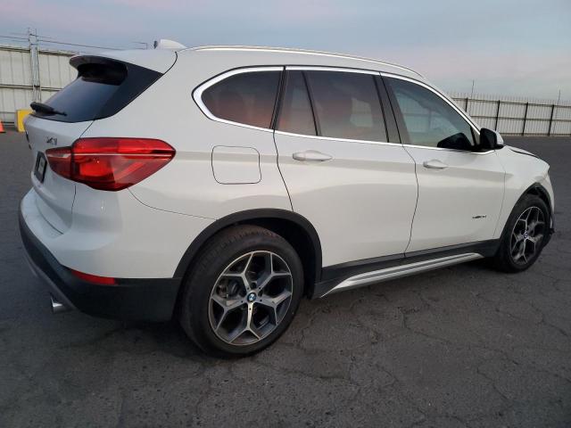 Изображение 3 2018 BMW X1 SDRIVE28I 2018 с VIN WBXHU7C30J5H44794