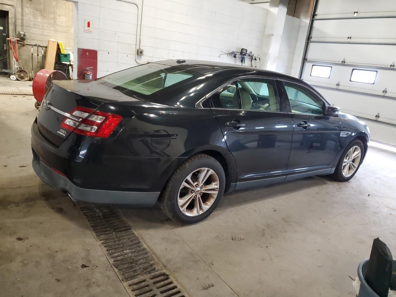 Obraz 3 z 2014 FORD TAURUS SEL 2014 z VIN 1FAHP2E85EG118977