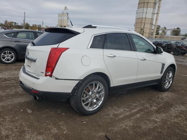 Изображение 3 2014 CADILLAC SRX PREMIUM COLLECTION 2014 с VIN 3GYFNGE38ES610780