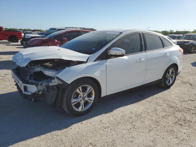 Image 1 of 2014 FORD FOCUS SE 2014 with VIN 1FADP3F20EL208074