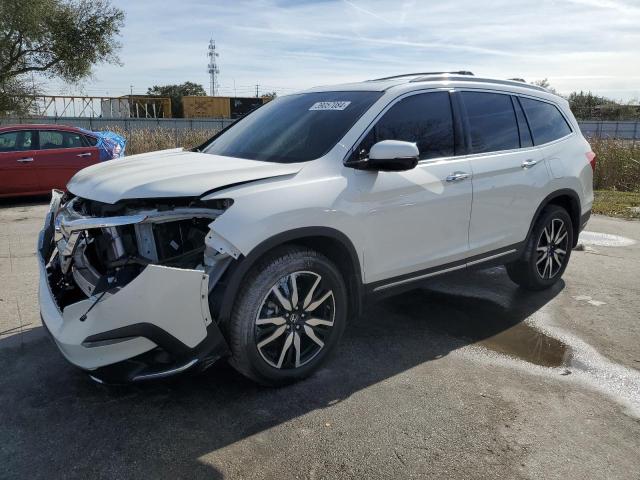 Изображение 1 2019 HONDA PILOT TOURING 2019 с VIN 5FNYF6H99KB070477