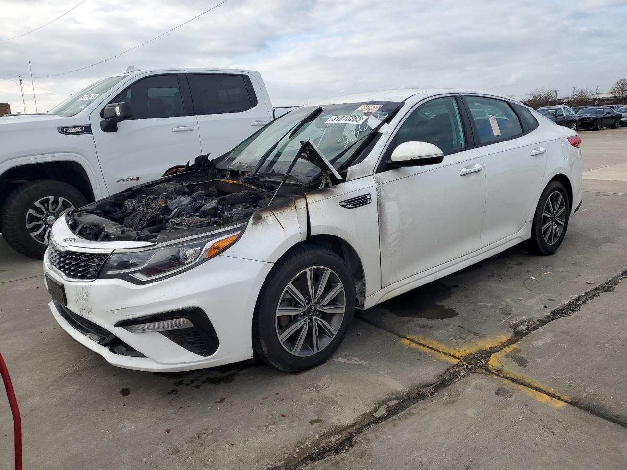 Изображение 1 2019 KIA OPTIMA LX 2019 с VIN 5XXGT4L38KG355258
