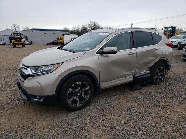 Obraz 1 z 2017 HONDA CR-V TOURING 2017 z VIN 5J6RW2H9XHL011158