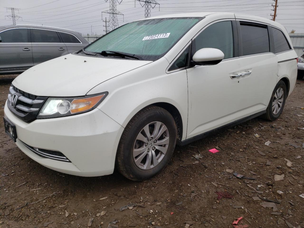 Изображение 1 2016 HONDA ODYSSEY SE 2016 с VIN 5FNRL5H30GB086027