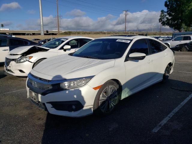 Obraz 1 z 2016 HONDA CIVIC EX 2016 z VIN 2HGFC1F31GH659379