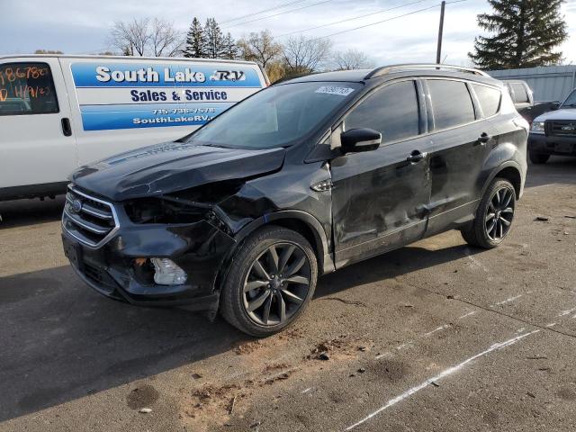 Image 1 of 2017 FORD ESCAPE TITANIUM 2017 with VIN 1FMCU9J98HUE28143