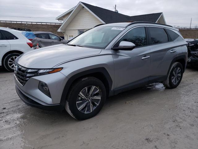 Image 1 of 2022 HYUNDAI TUCSON BLUE 2022 with VIN KM8JBCA1XNU077476