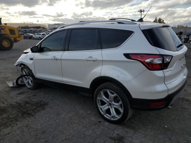 Изображение 2 2018 FORD ESCAPE TITANIUM 2018 с VIN 1FMCU9J95JUC35986