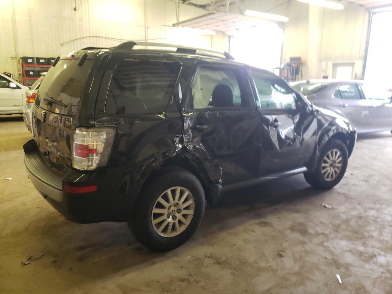 Image 3 of Mercury Mariner Premier 2011 with VIN 4M2CN8H75BKJ04614