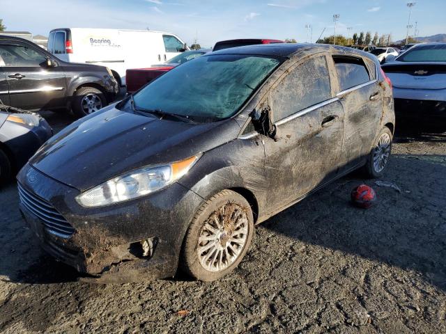 Image 1 of 2014 FORD FIESTA TITANIUM 2014 with VIN 3FADP4FJ9EM128235