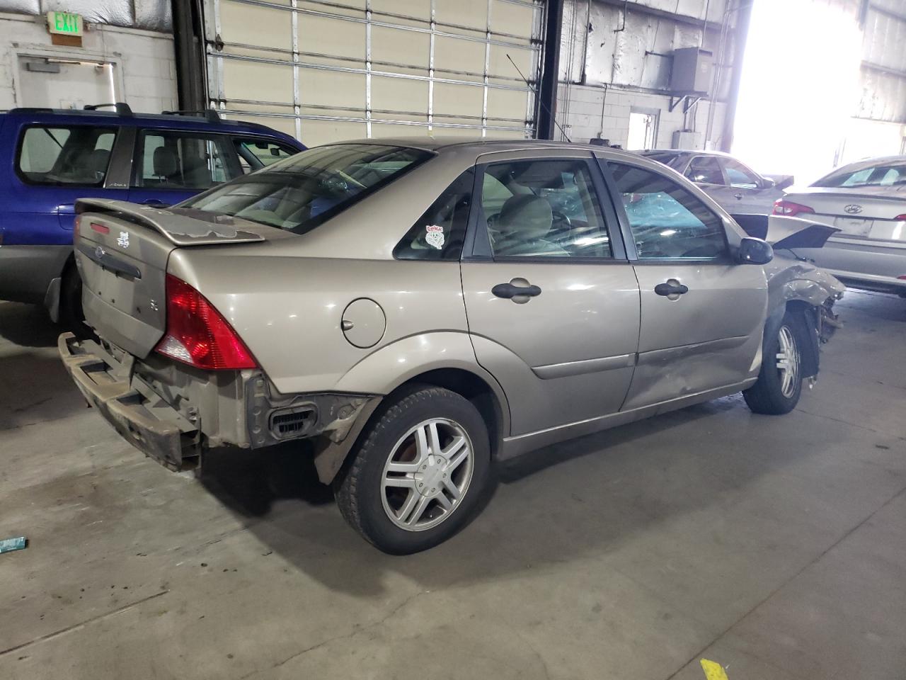 Obraz 3 z 2004 FORD FOCUS SE COMFORT 2004 z VIN 1FAFP34ZX4W167734