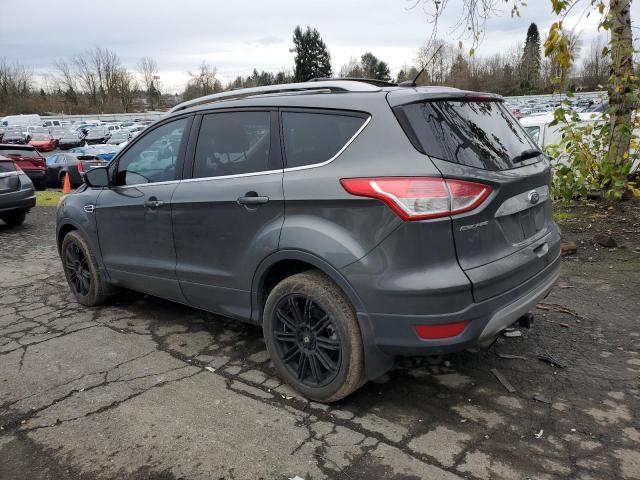 Obraz 2 z 2016 FORD ESCAPE TITANIUM 2016 z VIN 1FMCU9J90GUB83689