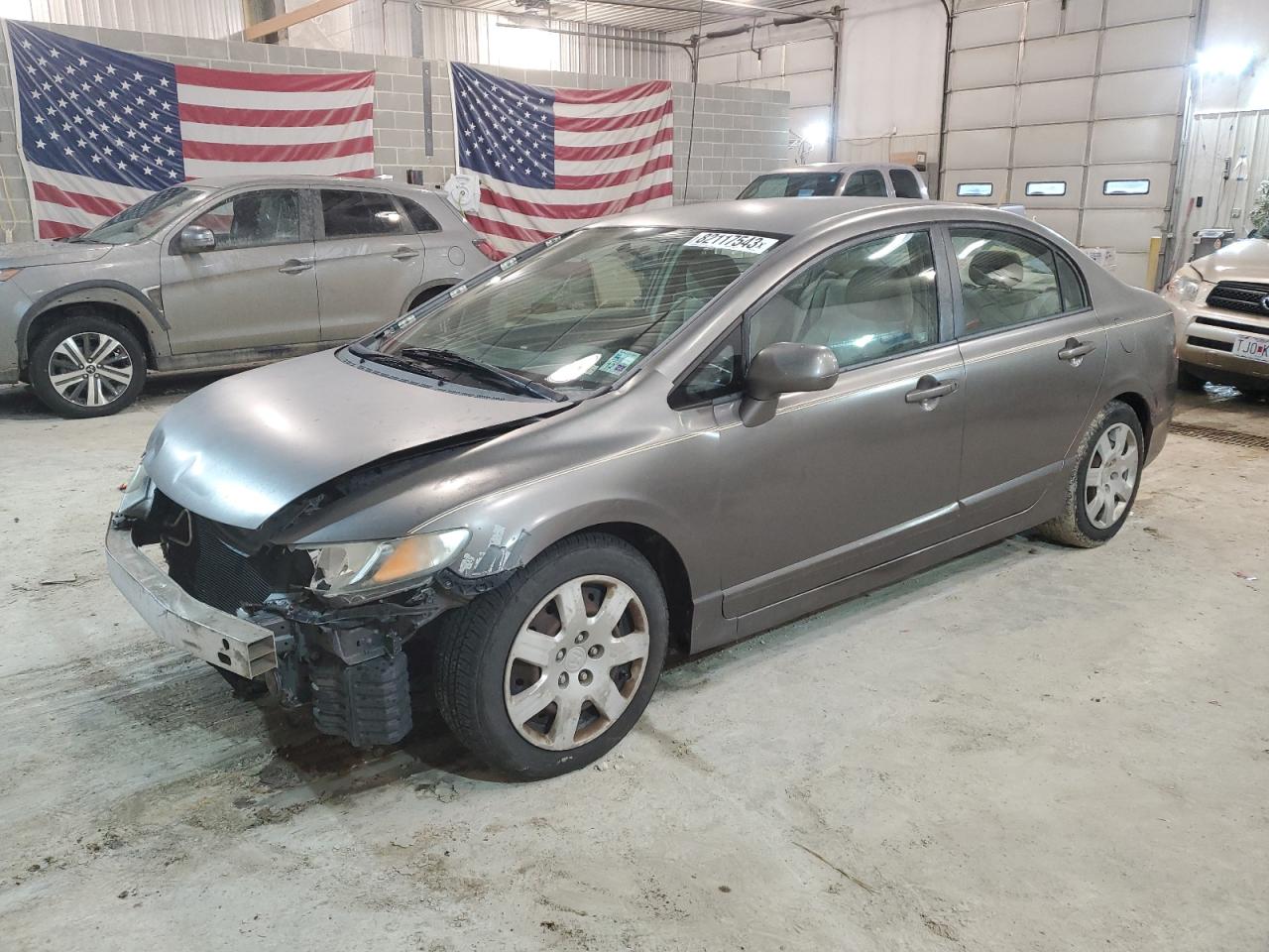 Obraz 1 z 2010 HONDA CIVIC LX 2010 z VIN 2HGFA1F50AH539958