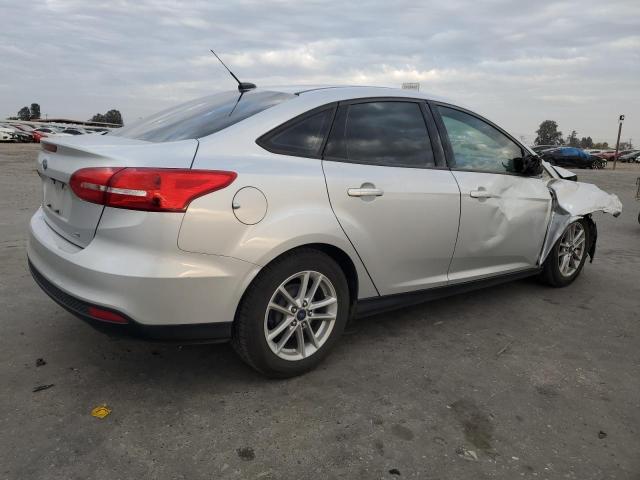 Obraz 3 z 2016 FORD FOCUS SE 2016 z VIN 1FADP3F21GL286494
