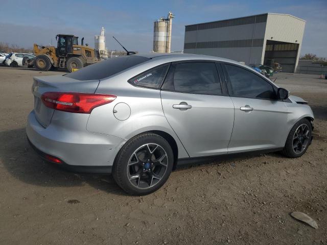 Изображение 3 2016 FORD FOCUS SE 2016 с VIN 1FADP3F28GL304599