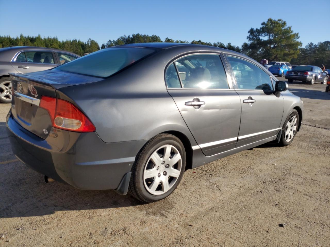 Obraz 3 z 2010 HONDA CIVIC LX 2010 z VIN 2HGFA1F50AH571972
