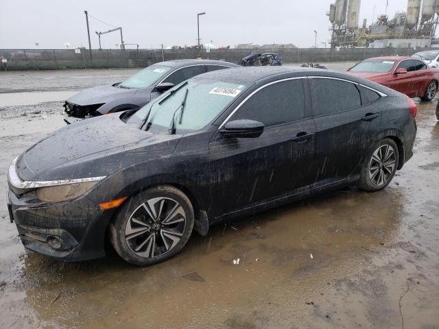 Obraz 1 z 2017 HONDA CIVIC EXL 2017 z VIN 2HGFC1F79HH631995