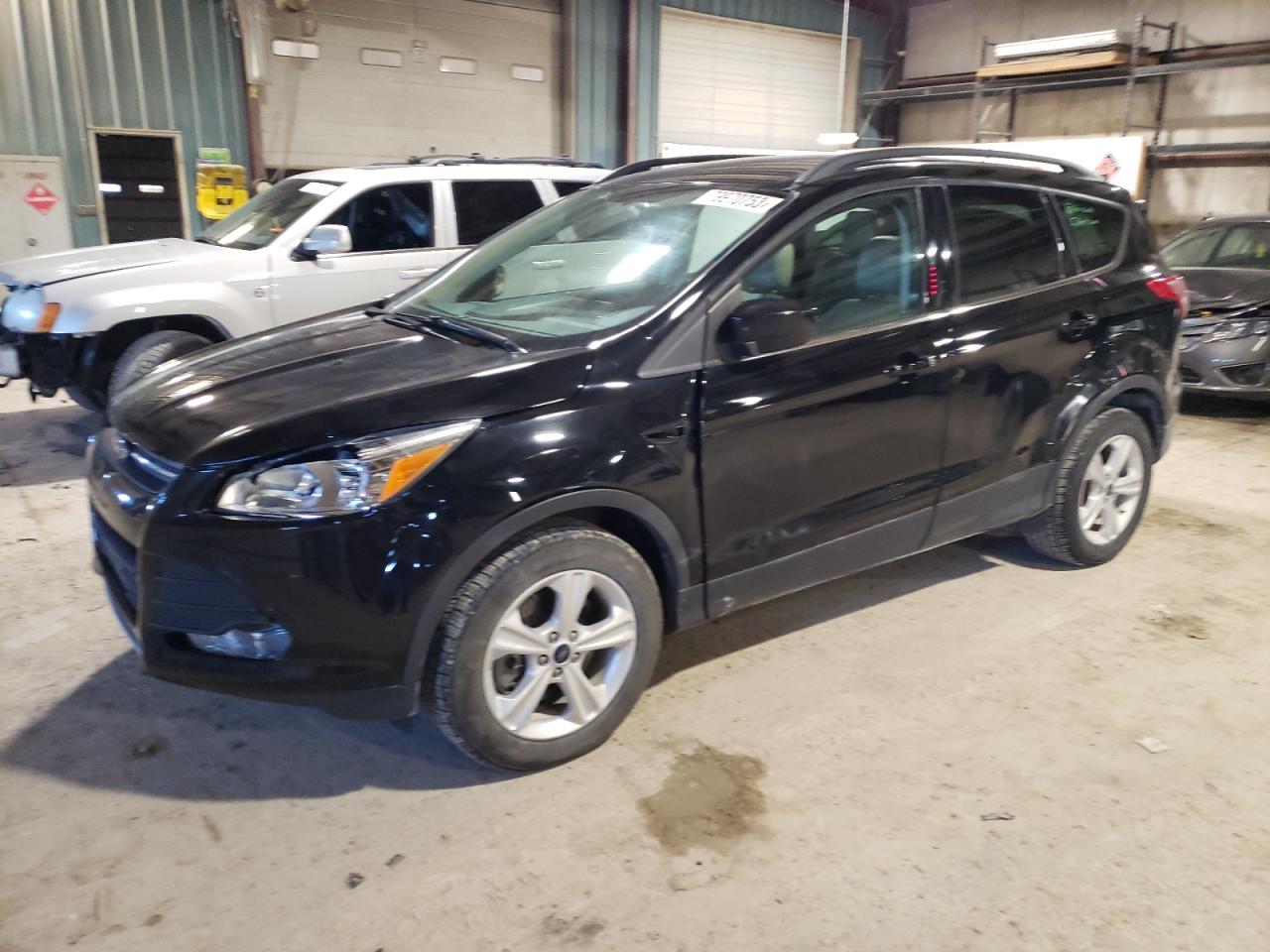 Image 1 of 2016 FORD ESCAPE SE 2016 with VIN 1FMCU9GX4GUC09300