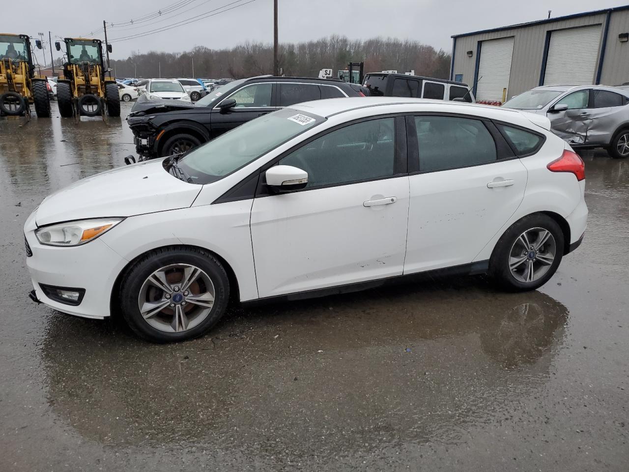 Image 1 of 2016 FORD FOCUS SE 2016 with VIN 1FADP3KE5GL259508