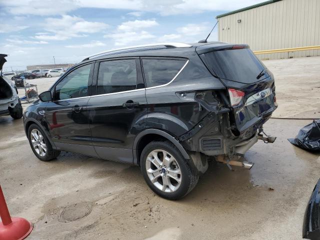 Obraz 2 z 2014 FORD ESCAPE TITANIUM 2014 z VIN 1FMCU0J91EUE56907