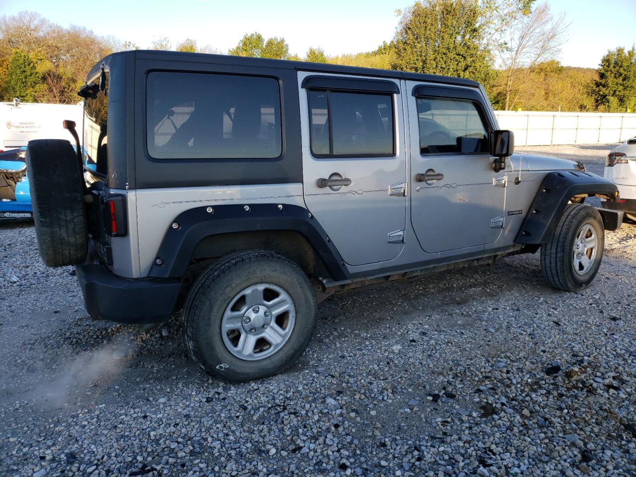 Image 3 of Jeep Wrangler Unlimited Sport 2013 with VIN 1C4BJWKG2DL620064