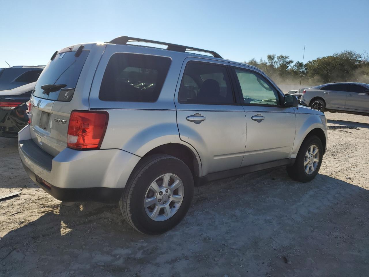 Изображение 3 2010 MAZDA TRIBUTE I 2010 с VIN 4F2CY0C79AKM03124