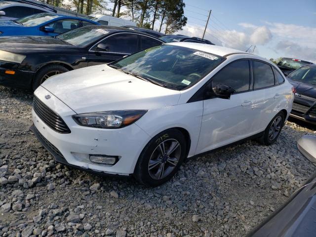 Image 1 of 2018 FORD FOCUS SE 2018 with VIN 1FADP3F27JL304942