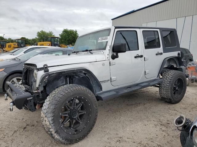 Image 1 of 2010 JEEP WRANGLER UNLIMITED SAHARA 2010 with VIN 1J4HA5H12AL195250