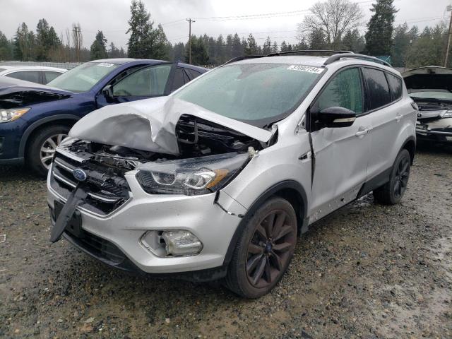Image 1 of 2017 FORD ESCAPE TITANIUM 2017 with VIN 1FMCU9J96HUC11884