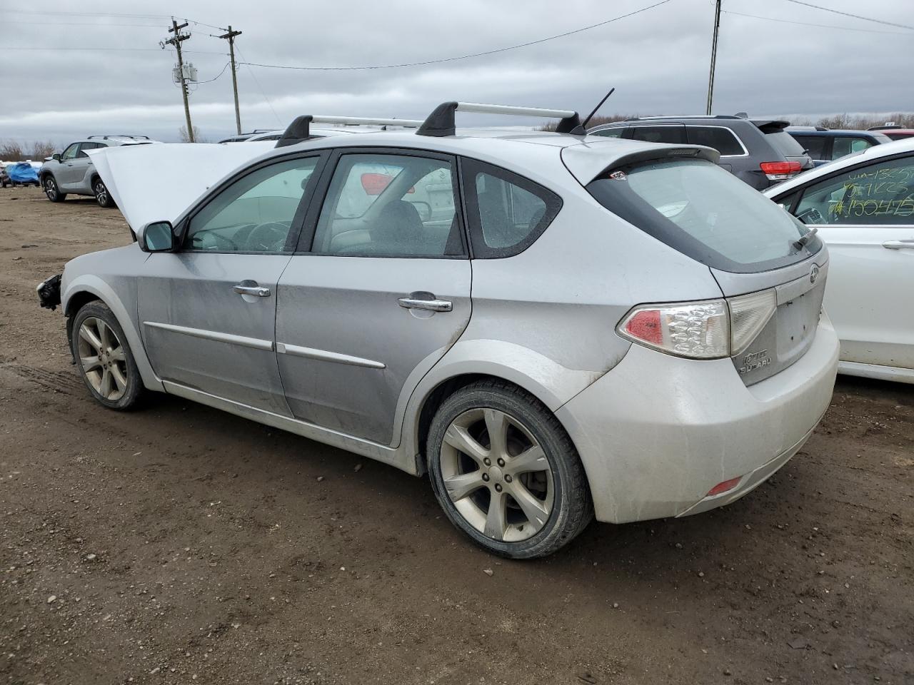 Image 2 of 2009 SUBARU IMPREZA OUTBACK SPORT 2009 with VIN JF1GH63659H815731