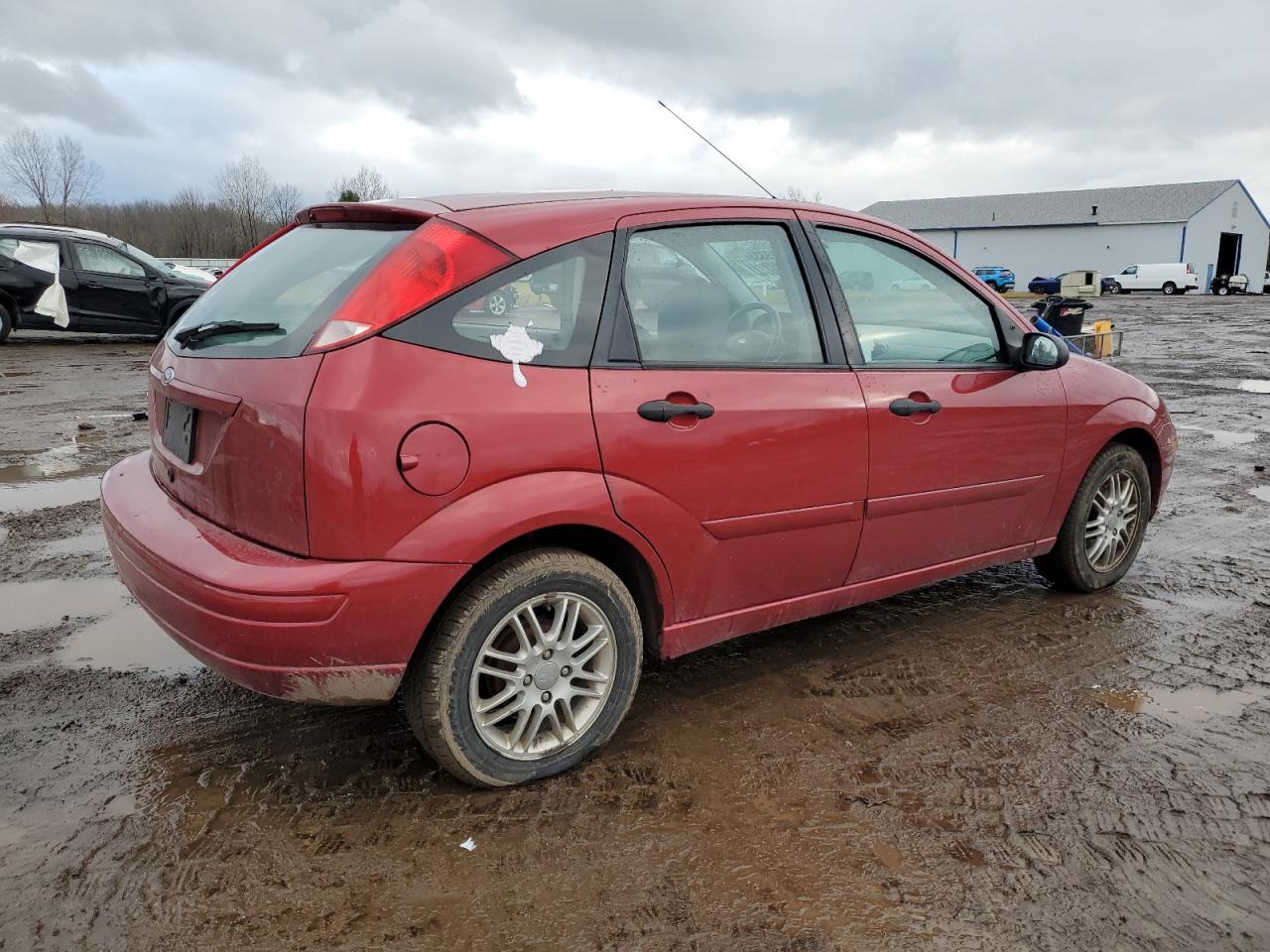 Obraz 3 z 2004 FORD FOCUS ZX5 2004 z VIN 3FAFP37334R121060