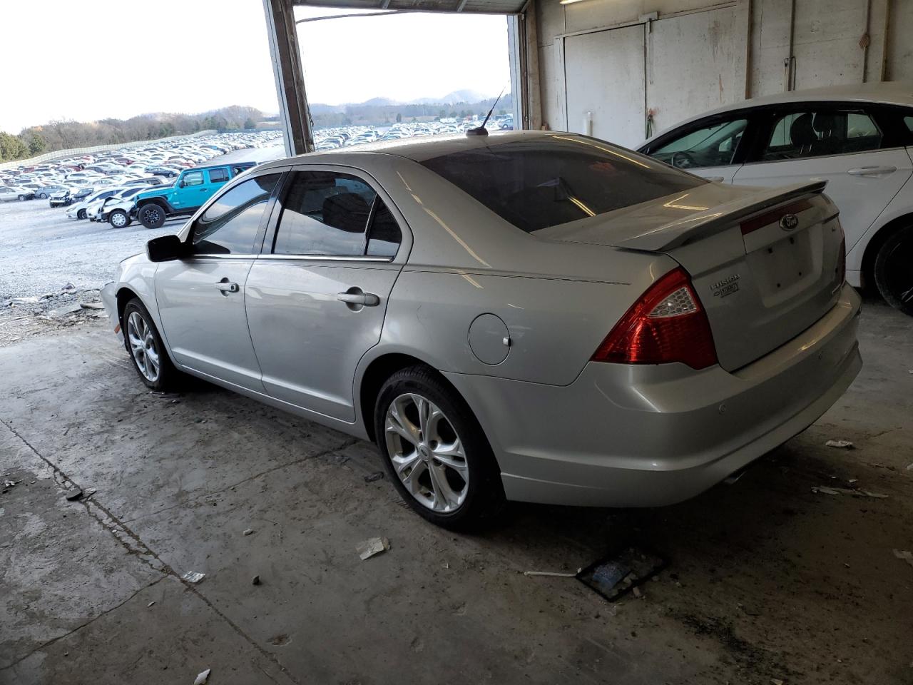 Obraz 2 z 2012 FORD FUSION SE 2012 z VIN 3FAHP0HG6CR228482