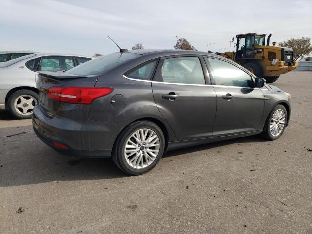 Image 3 of 2016 FORD FOCUS TITANIUM 2016 with VIN 1FADP3J22GL314259