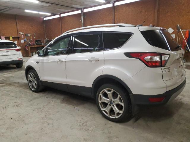Obraz 2 z 2017 FORD ESCAPE TITANIUM 2017 z VIN 1FMCU9J99HUA37292