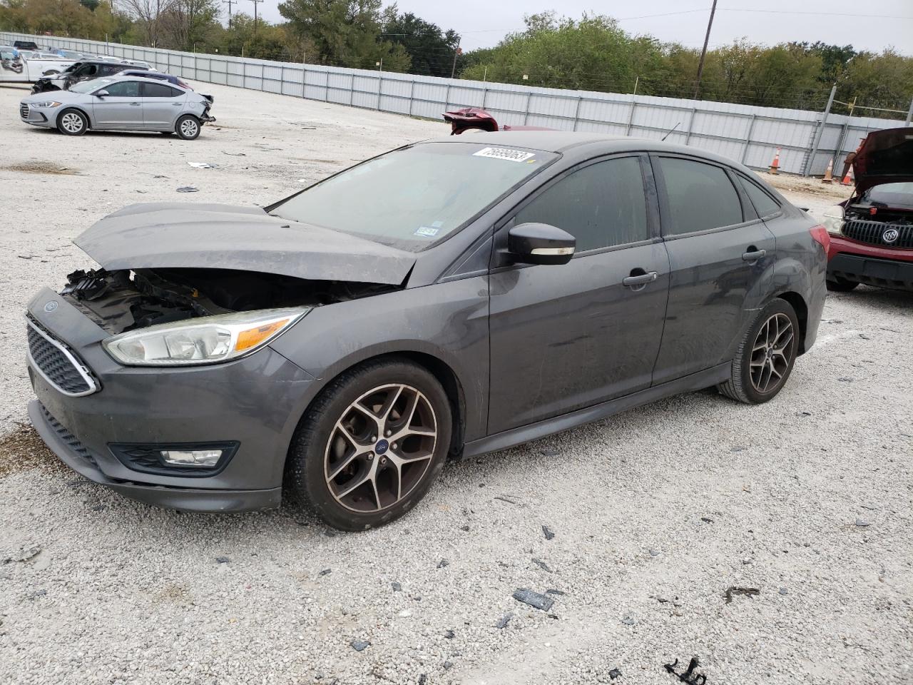 Изображение 1 2015 FORD FOCUS SE 2015 с VIN 1FADP3F28FL340615