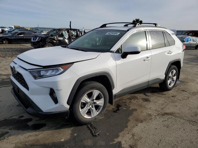 Image 1 of 2020 TOYOTA RAV4 XLE 2020 with VIN JTMP1RFV9LD063467