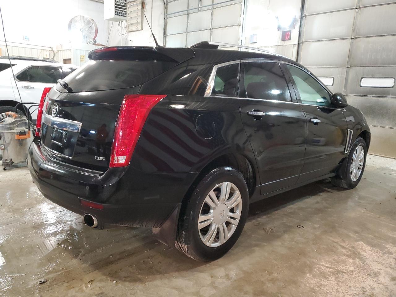 Изображение 3 2014 CADILLAC SRX LUXURY COLLECTION 2014 с VIN 3GYFNBE31ES661637