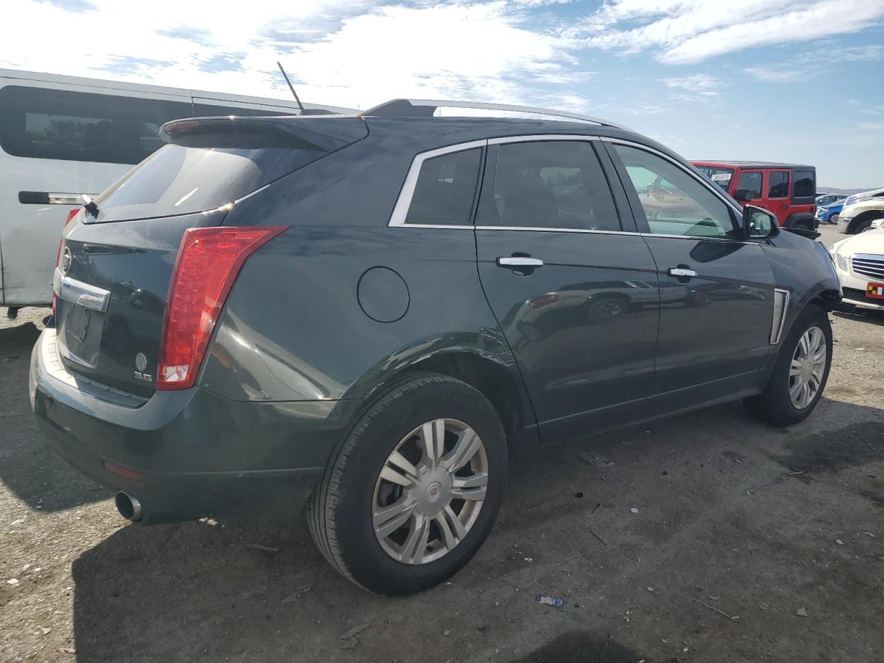 Изображение 3 Cadillac Srx Luxury Collection 2015 с VIN 3GYFNEE31FS571004