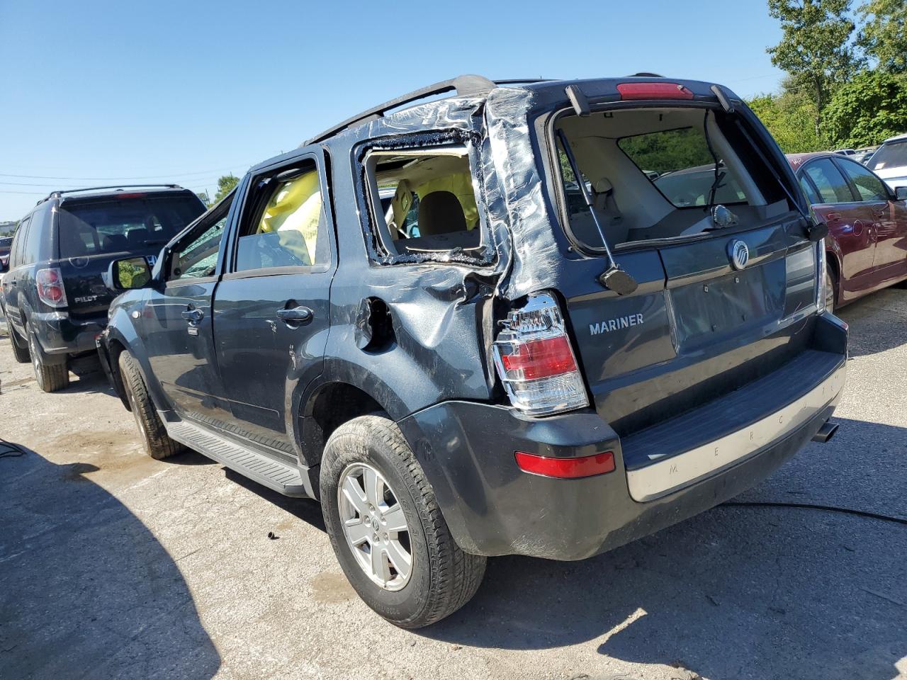 Obraz 2 z Mercury Mariner 2009 z VIN 4M2CU81G39KJ23105