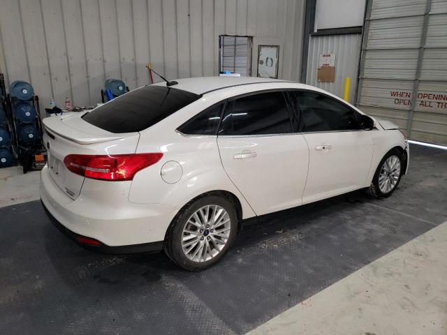 Image 3 of 2015 FORD FOCUS TITANIUM 2015 with VIN 1FADP3J22FL340858