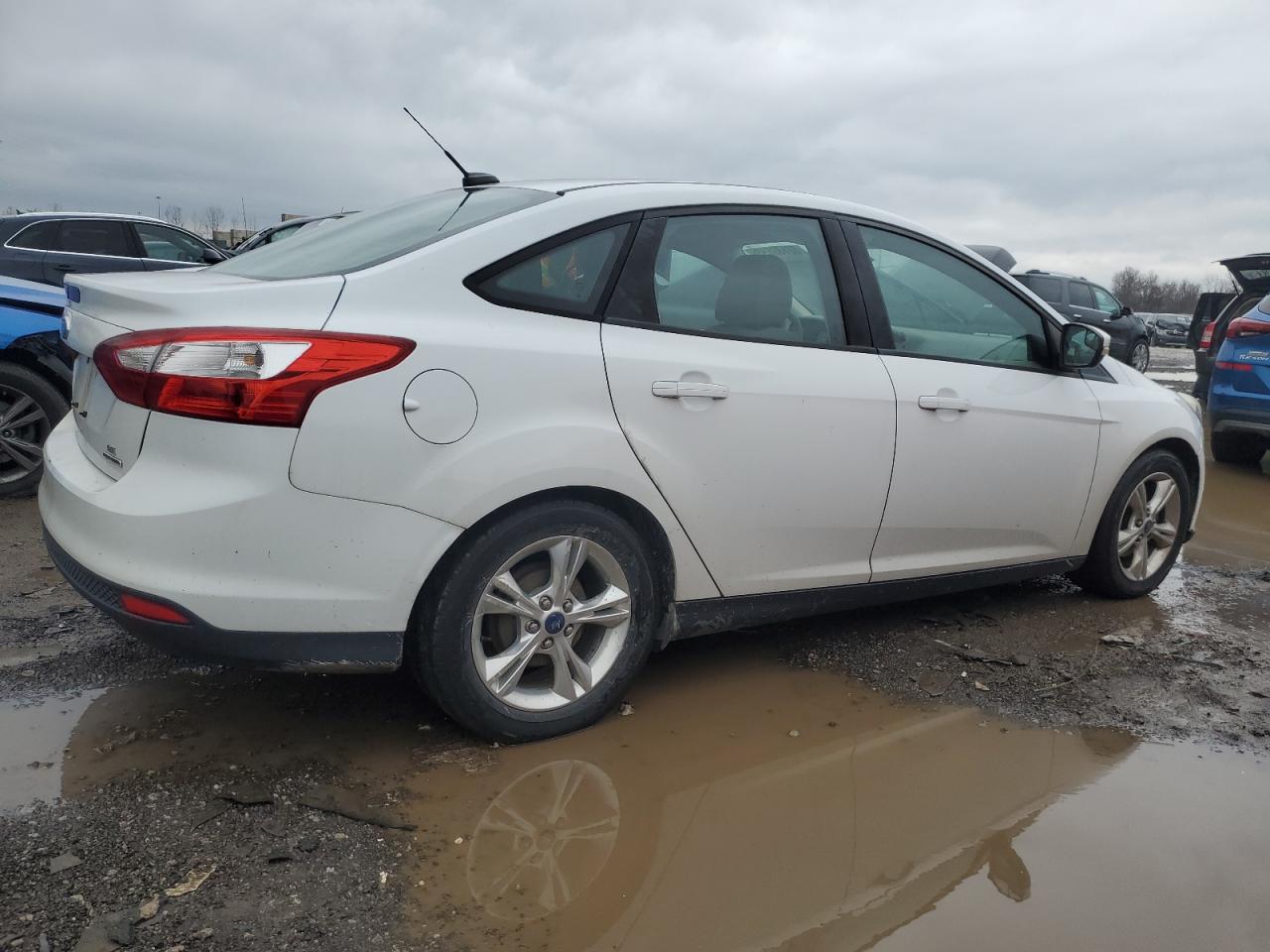 Image 3 of 2014 FORD FOCUS SE 2014 with VIN 1FADP3F25EL129080
