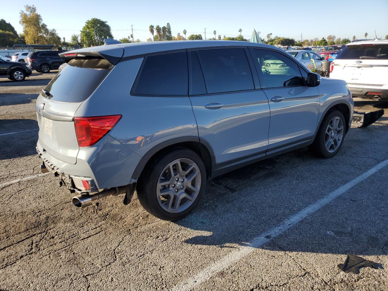 Изображение 3 2022 HONDA PASSPORT EXL 2022 с VIN 5FNYF7H57NB001553