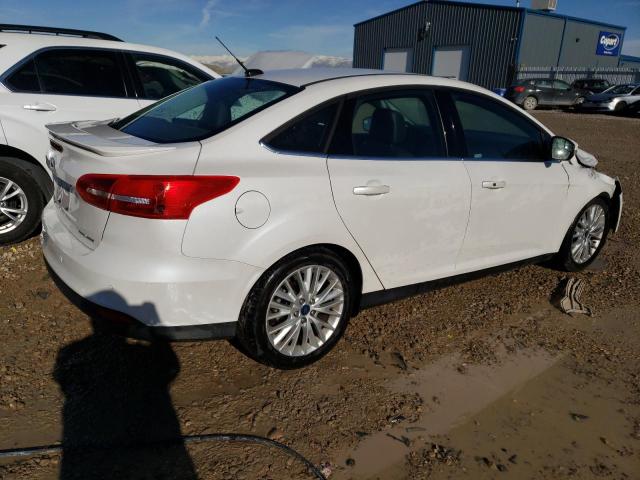 Image 3 of 2016 FORD FOCUS TITANIUM 2016 with VIN 1FADP3J2XGL334839